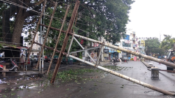 In Coimbatore Sittapudur, a truck collided and caused an electric pole to lean and fall, resulting in traffic disruption on the road.