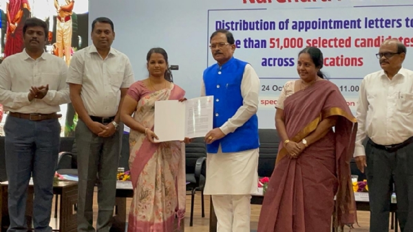 In Coimbatore, Union Minister of State Shripad Yesso Naik distributed appointment letters to 51 people during the Rozgar Mela (employment fair). In Coimbatore, Union Minister of State Shripad Yesso Naik distributed appointment letters to 51 people during the Rozgar Mela (employment fair).
