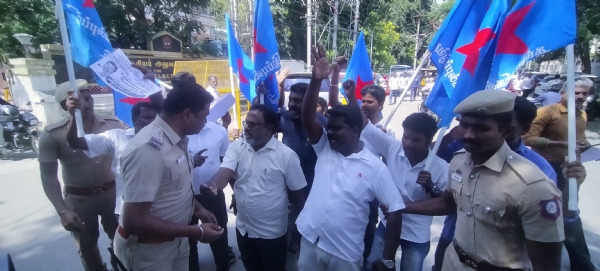 Coimbatore: Tamil Puligal Party members burn effigies of Edappadi Palaniswami and Modi. Coimbatore: Tamil Puligal Party members burn effigies of Edappadi Palaniswami and Modi.