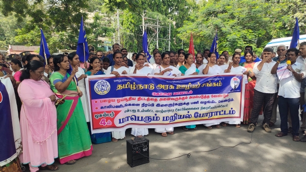 In Coimbatore, Tamil Nadu government employee union members were arrested for participating in a road blockade to press various demands. In Coimbatore, Tamil Nadu government employee union members were arrested for participating in a road blockade to press various demands.
