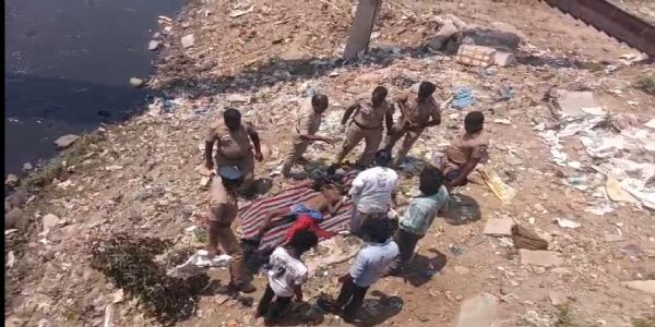 கூவம் ஆறு அருகே ஆண் சடலம் - போலீசார் தீவிர விசாரணை