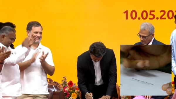 CM Vijay Sign