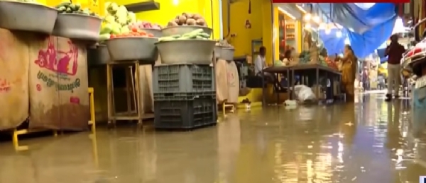 Traders face severe hardship as rainwater floods