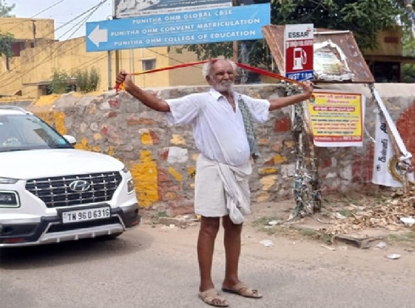 Elderly man engages in road blockade.