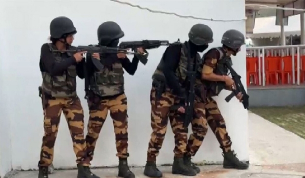 Security forces conduct a drill at the Uttarakhand