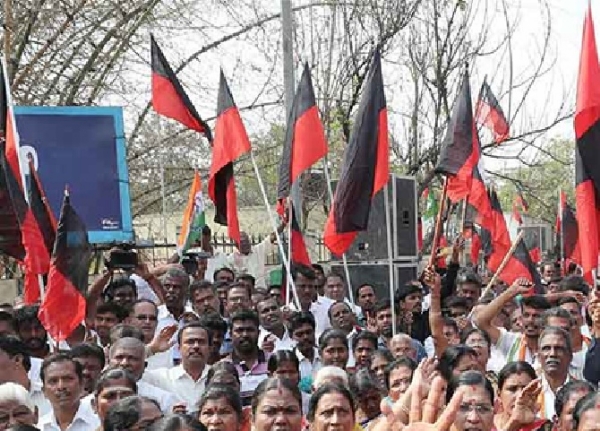 DMK cadres stage road blockade DMK cadres stage road blockade